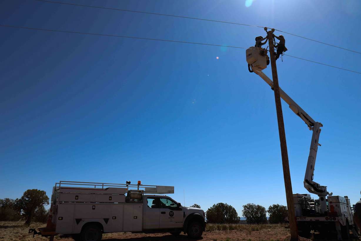 A Murray City power crew during electrification efforts as part of the Light Up Navajo initiative in April.
