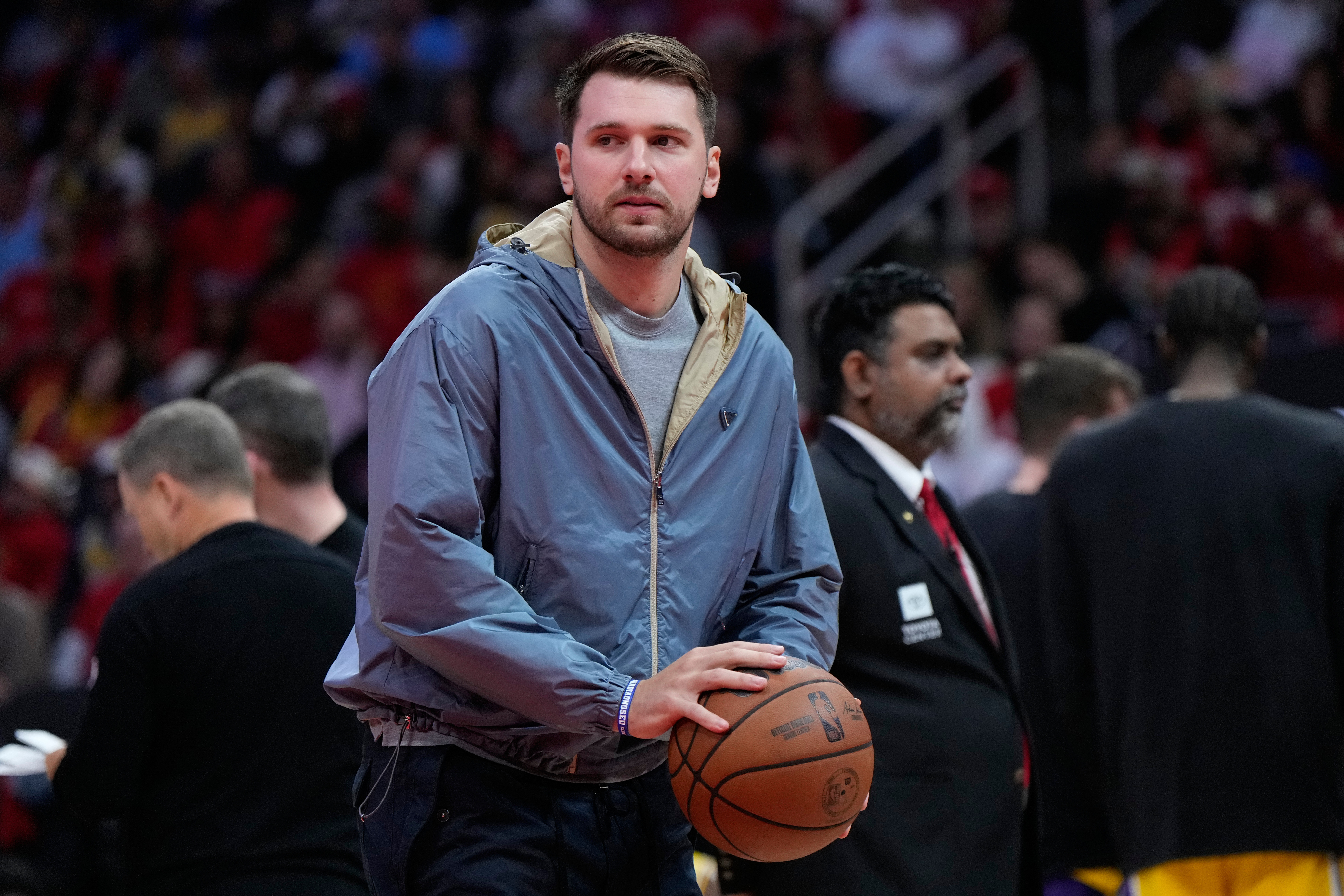 Los Angeles Lakers guard Luka Doncic holds a ball during a timeout in the first half of Game 6 of a first-round NBA playoffs basketball series against the Houston Rockets in Houston, Friday, May 1, 2026. 