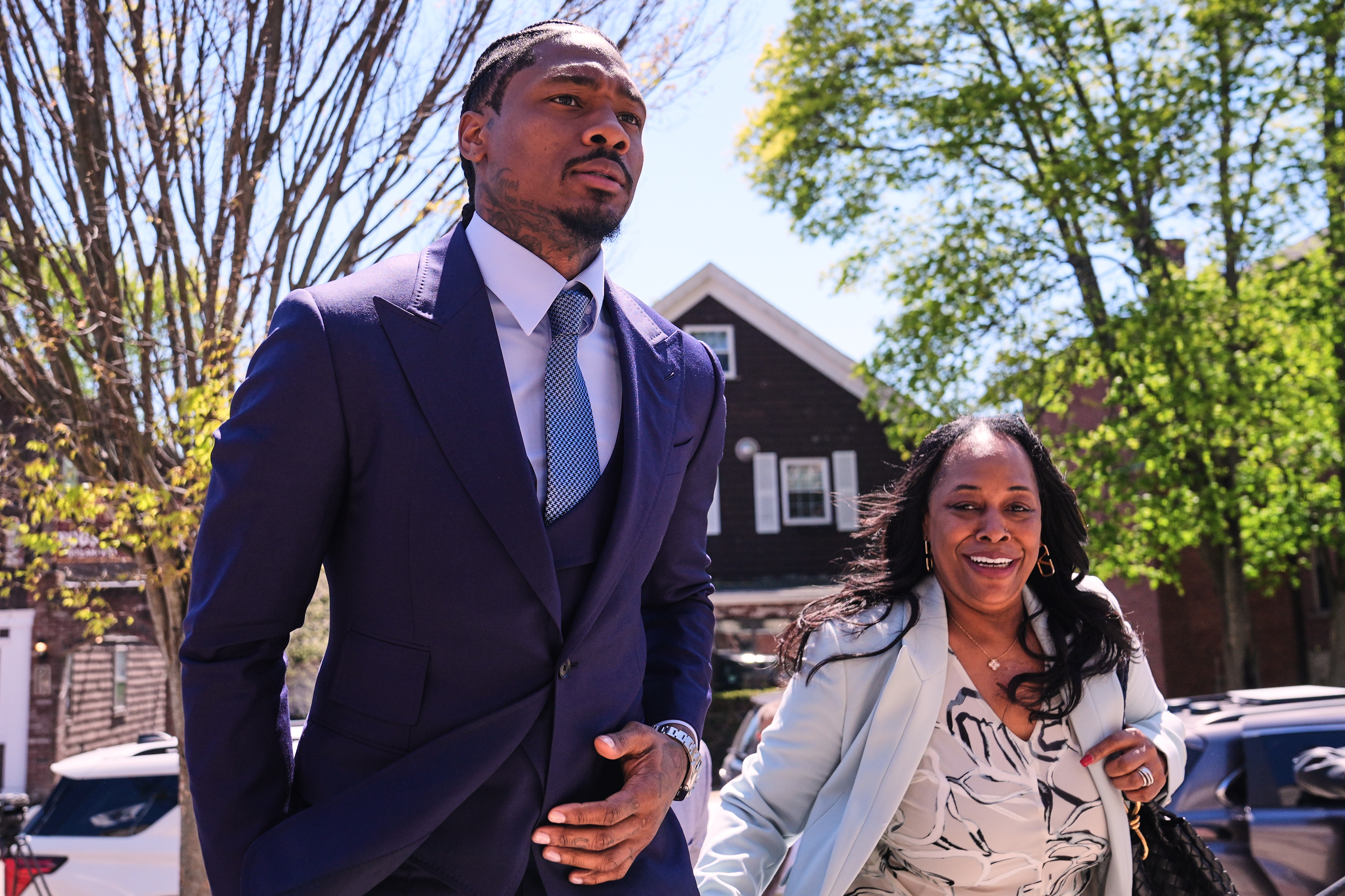 Former New England Patriots wide receiver Stefon Diggs returns to Norfolk County District Court, Monday, May 4, 2026, in Dedham, Mass.