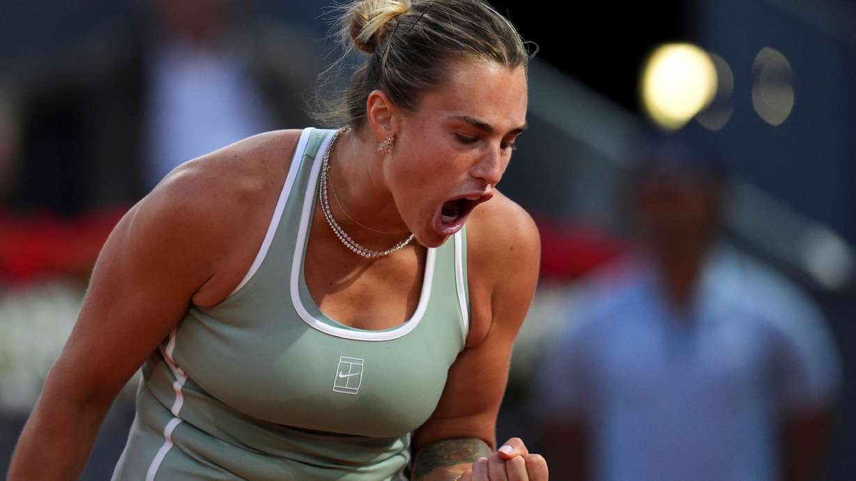 Aryna Sabalenka of Belarus celebrates a point during her match against Hailey Baptiste of the U.S. during the Madrid Open tennis tournament in Madrid, Tuesday, April 28, 2026.