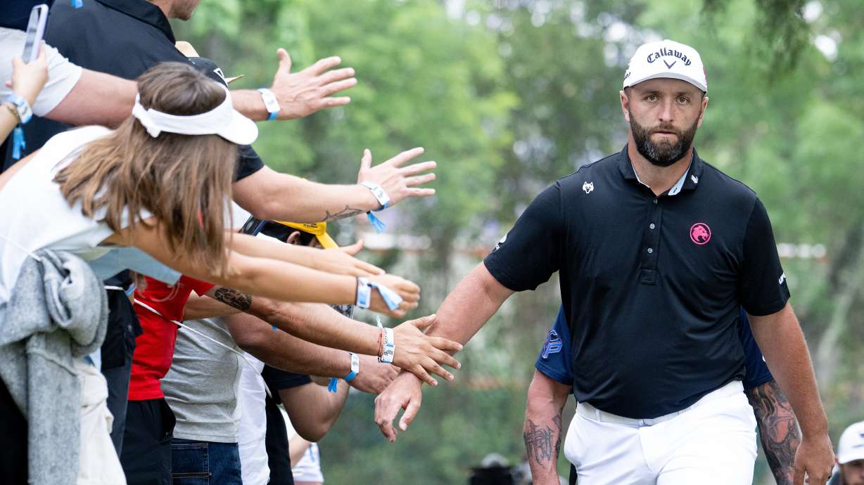 Captain Jon Rahm, right, of Legion XIII, greets fans as he walks to the sixth tee during the final round of LIV Golf Mexico City at Club de Golf Chapultepec on Sunday, April 19, 2026 in Naucalpan, Mexico.