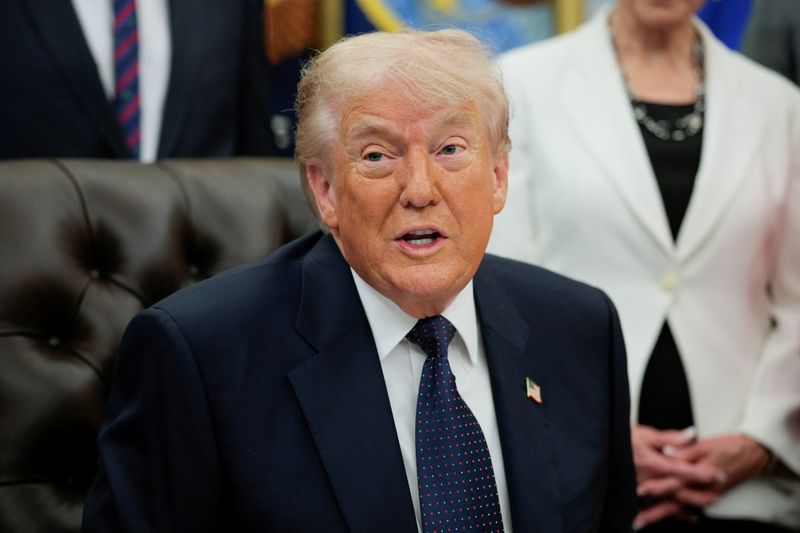 Trump pauses effort to escort ships in Strait of Hormuz, citing talks progress