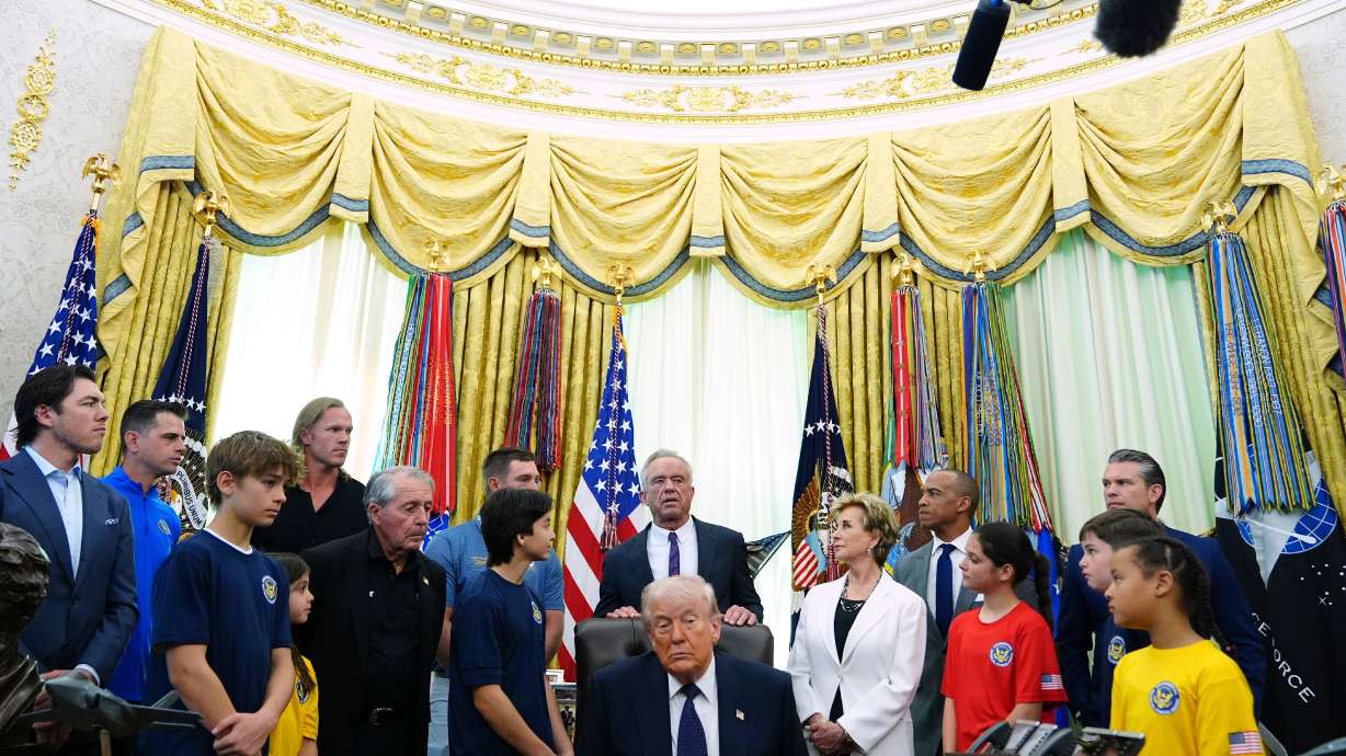 Health and Human Services Secretary Robert F. Kennedy Jr. speaks as President Donald Trump listens before the signing of a proclamation in the Oval Office at the White House, Tuesday, May 5, 2026, in Washington.