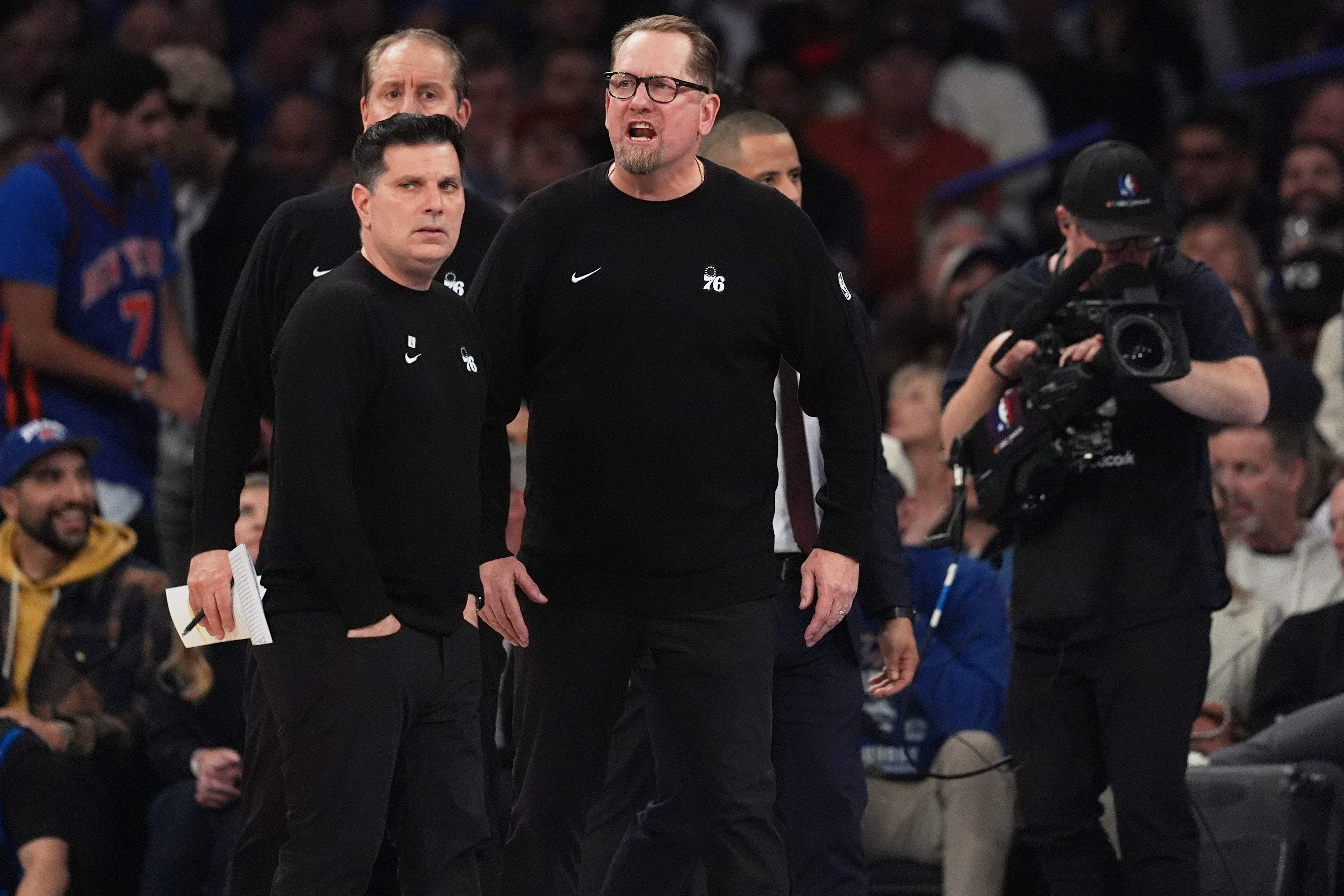 Philadelphia 76ers' Nick Nurse, center, yells during a time out during the second half of Game 1 in a second-round NBA basketball playoffs series against the New York Knicks Monday, May 4, 2026, in New York. 