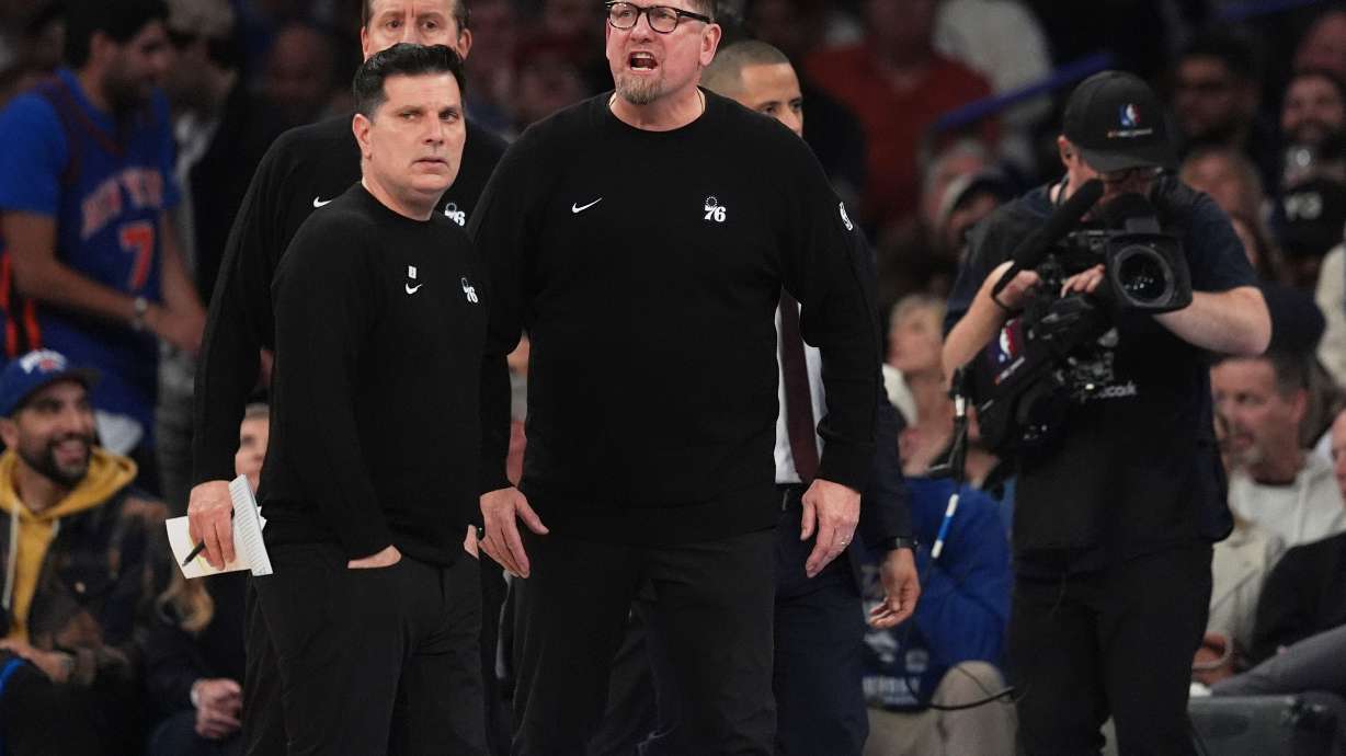 Philadelphia 76ers' Nick Nurse, center, yells during a time out during the second half of Game 1 in a second-round NBA basketball playoffs series against the New York Knicks Monday, May 4, 2026, in New York.