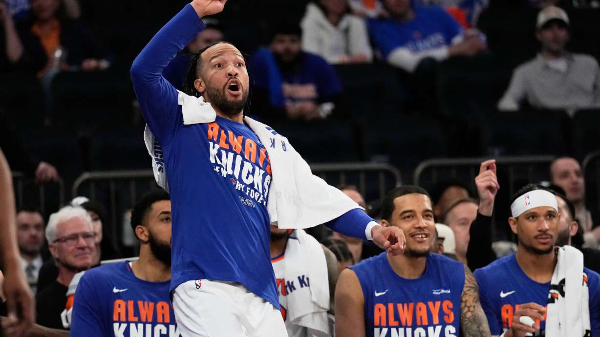New York Knicks' Jalen Brunson reacts while watching from the bench during the second half of Game 1 in a second-round NBA basketball playoffs series against the Philadelphia 76ers Monday, May 4, 2026, in New York.