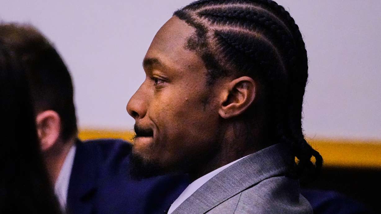 Former New England Patriots wide receiver Stefon Diggs reacts after a not guilty verdict at his trial at Norfolk County District Court, Tuesday, May 5, 2026, in Dedham, Mass.