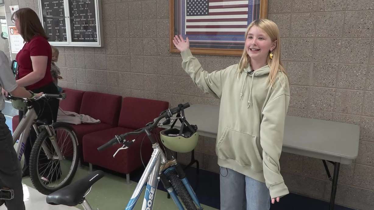 Poppy Merchant with her new bike, Tuesday. Poppy thought she was in trouble when she was originally called out of class.