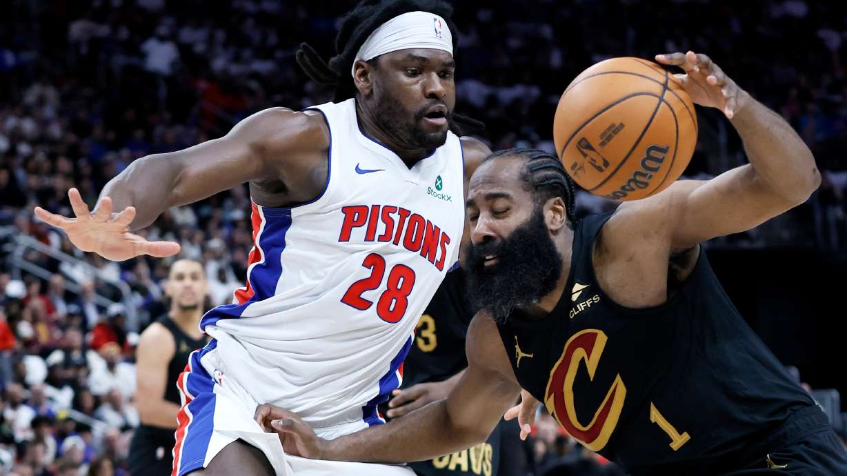 Cleveland Cavaliers guard James Harden (1) drives against Detroit Pistons forward Isaiah Stewart (28) during the first half in Game 1 of a second-round NBA playoffs basketball series Tuesday, May 5, 2026, in Detroit.