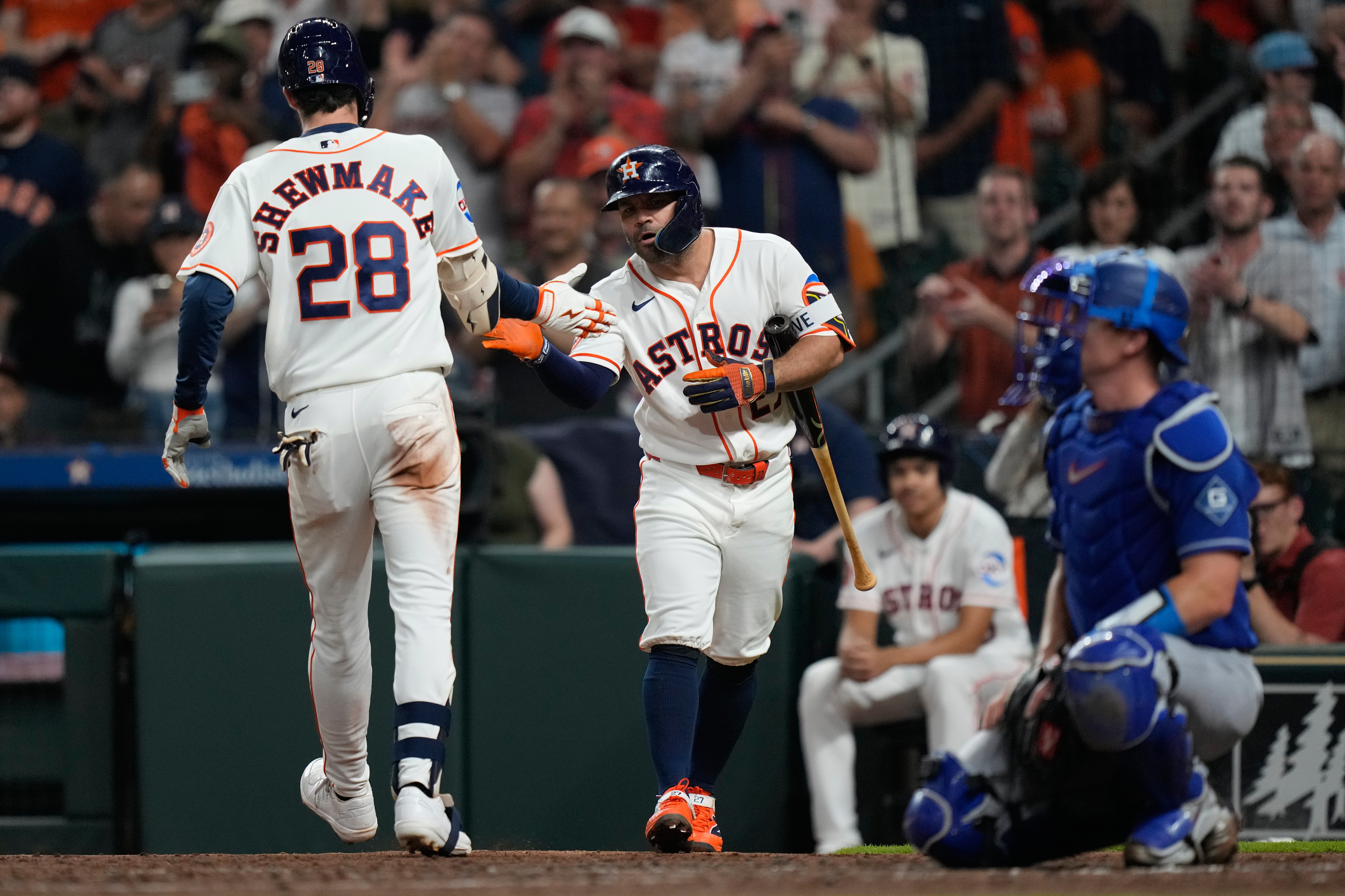 Houston Astros' Braden Shewmake (28) celebrates with Jose Altuve after hitting a home run during the third inning of a baseball game against the Los Angeles Dodgers in Houston, Tuesday, May 5, 2026. 