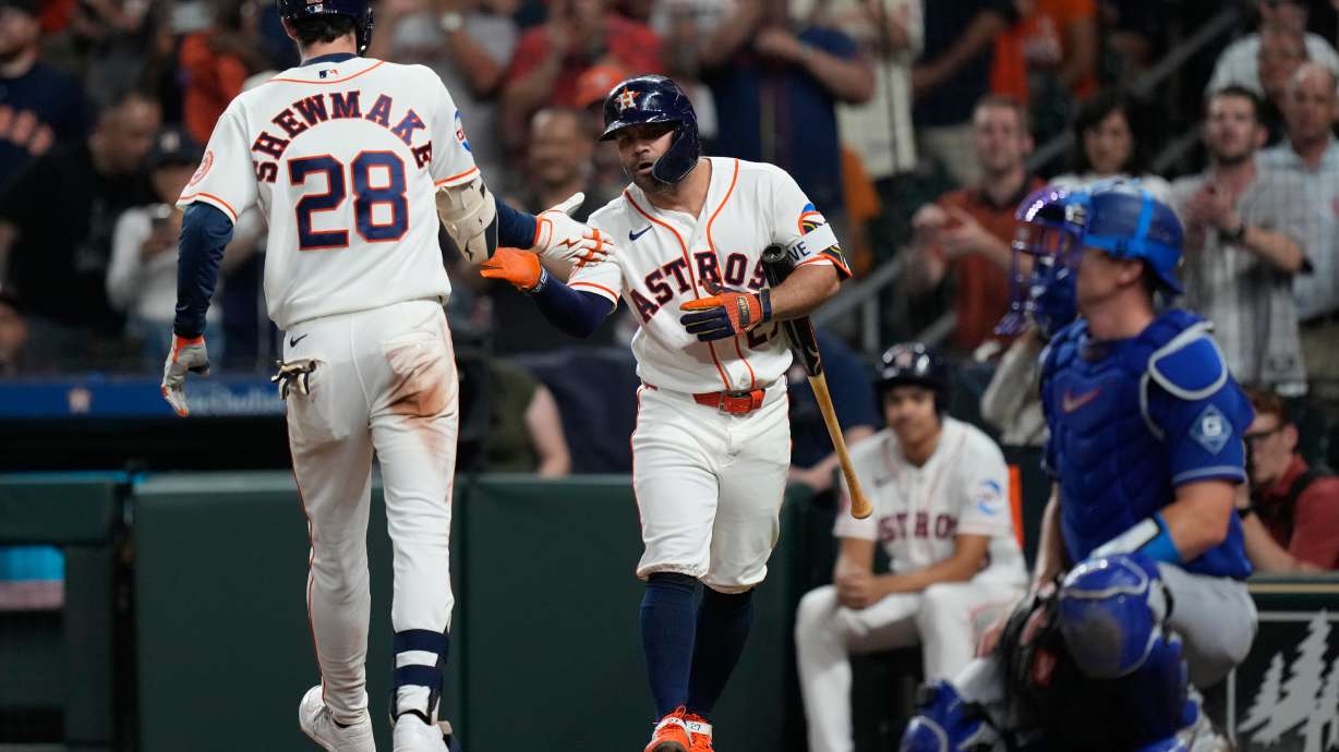 Houston Astros' Braden Shewmake (28) celebrates with Jose Altuve after hitting a home run during the third inning of a baseball game against the Los Angeles Dodgers in Houston, Tuesday, May 5, 2026.