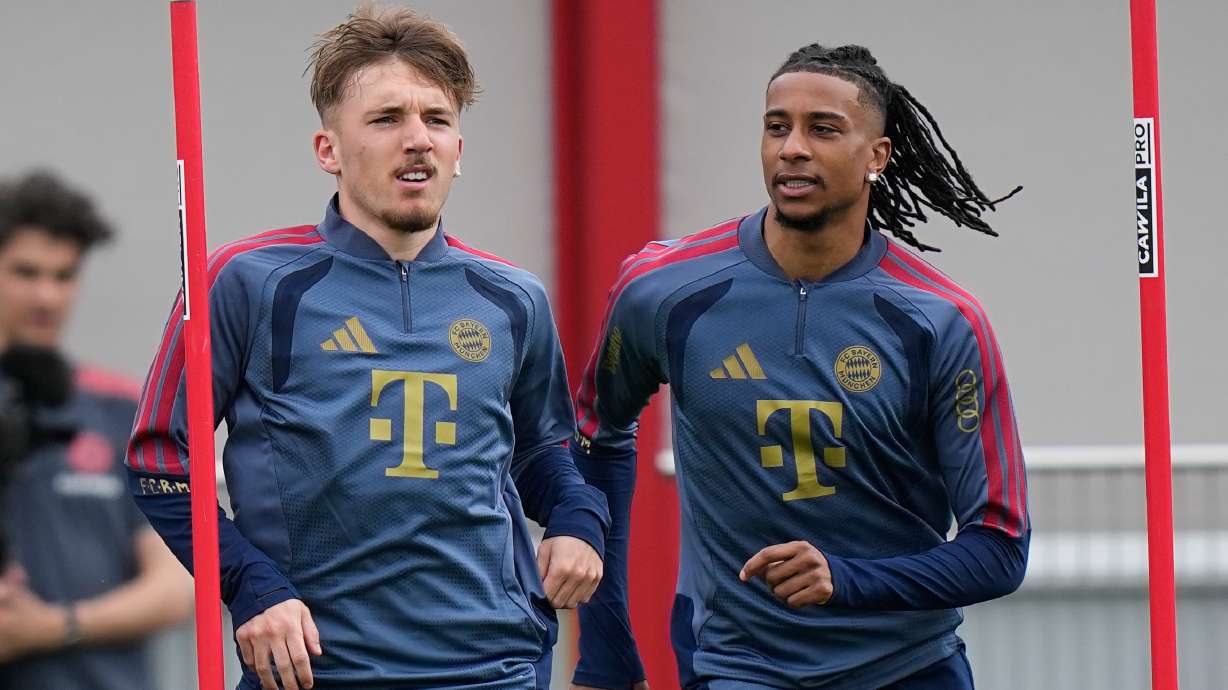 Munich's Lebbart Karl, left, and Michael Olise attend a training session in Munich, Germany, Tuesday, May 5, 2026, ahead of the Champions League semifinal second leg soccer match between FC Bayern and PSG.