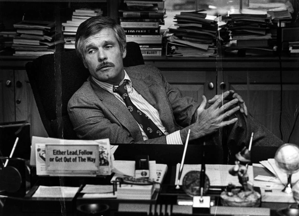 Ted Turner is seen at his desk inside the CNN Center in 1982.
