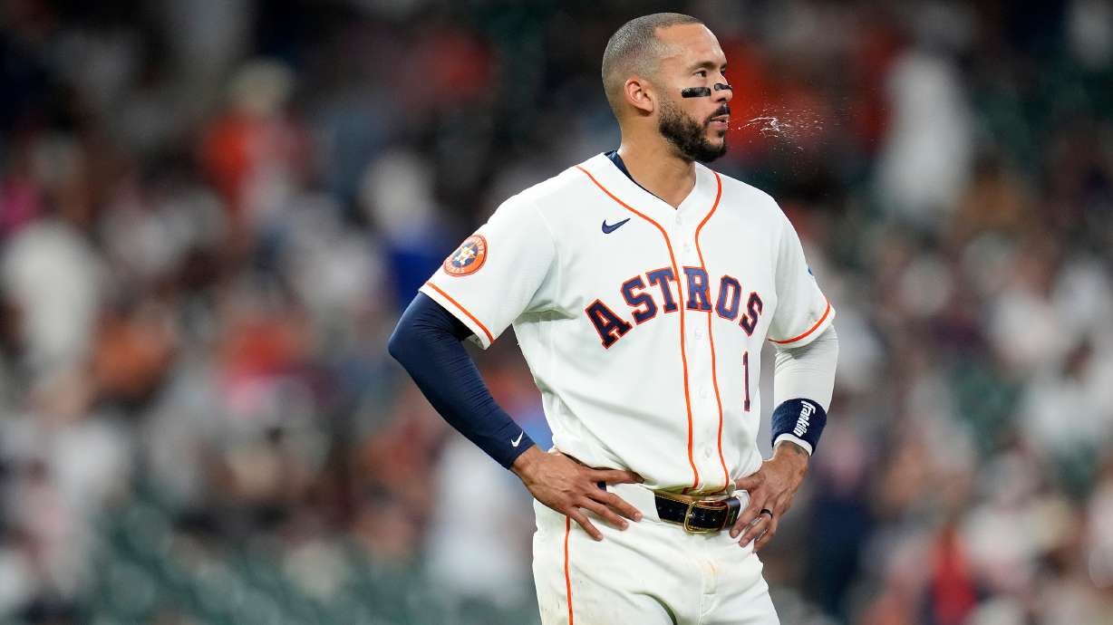 Houston Astros' Carlos Correa (1) reacts after the eighth inning of a baseball game against the New York Yankees, Saturday, April 25, 2026, in Houston.