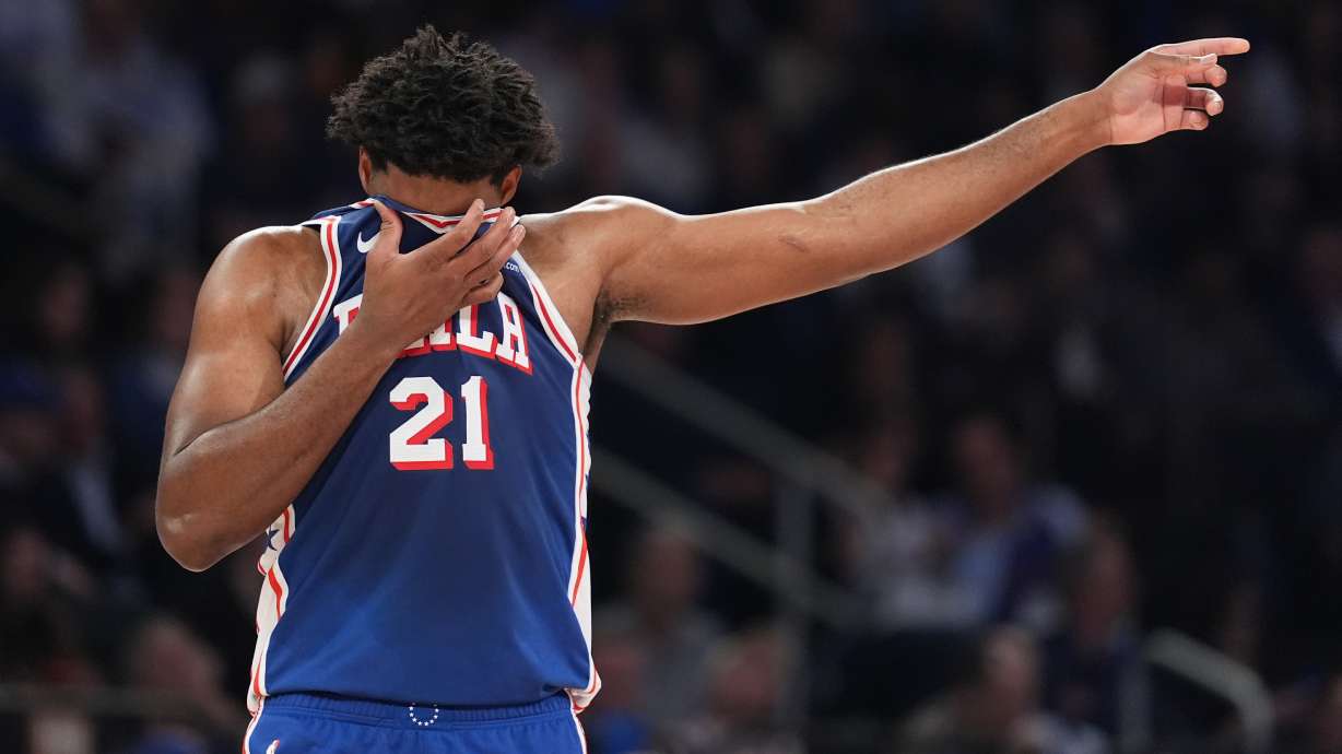 Philadelphia 76ers' Joel Embiid reacts during the first half of Game 1 in a second-round NBA basketball playoffs series against the New York Knicks Monday, May 4, 2026, in New York.