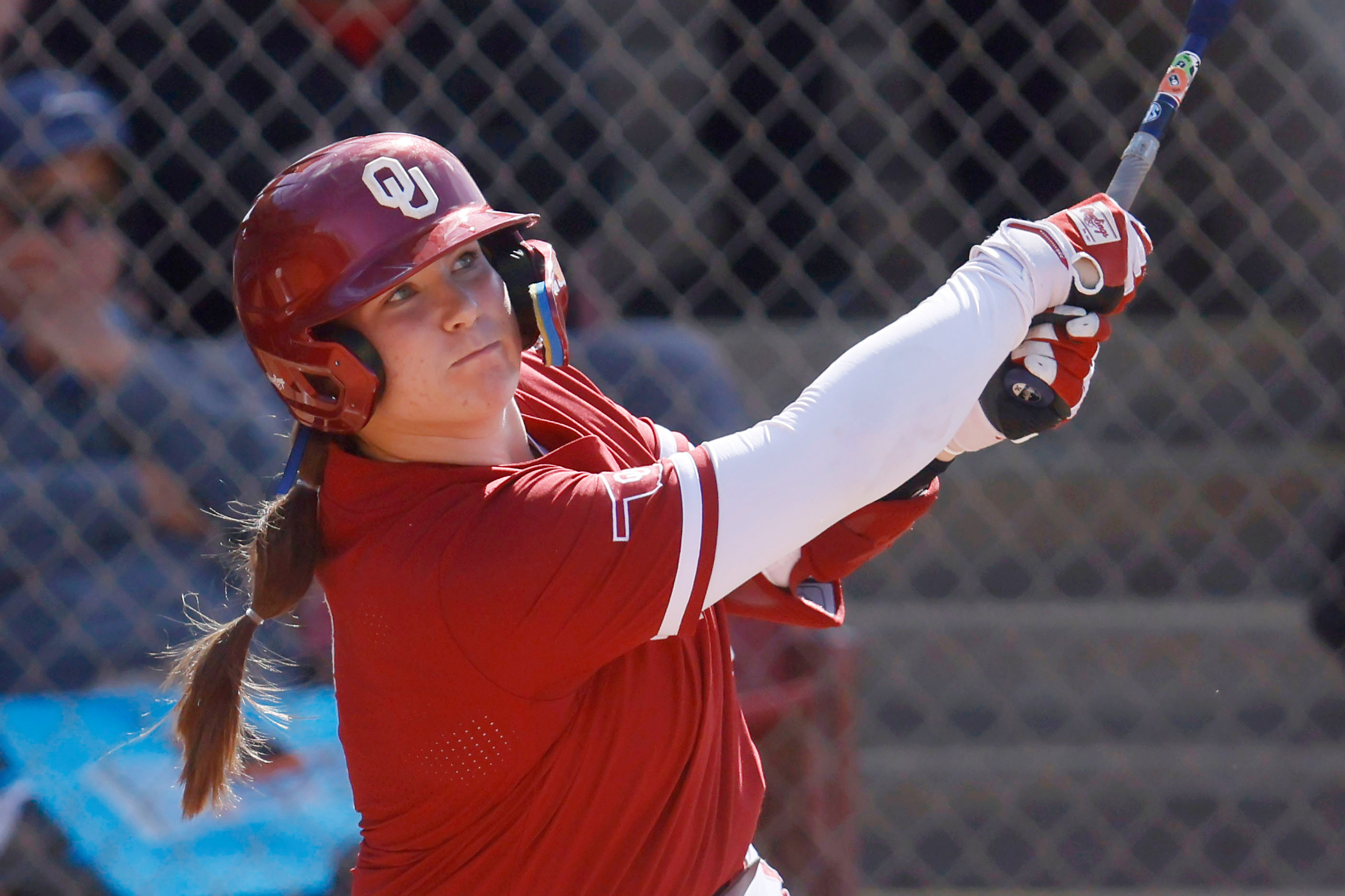 In a battle like McGwire and Sosa's '98 home run chase, Oklahoma, UCLA softball sluggers near record