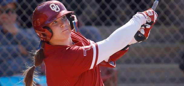 In a battle like McGwire and Sosa's '98 home run chase, Oklahoma, UCLA softball sluggers near record