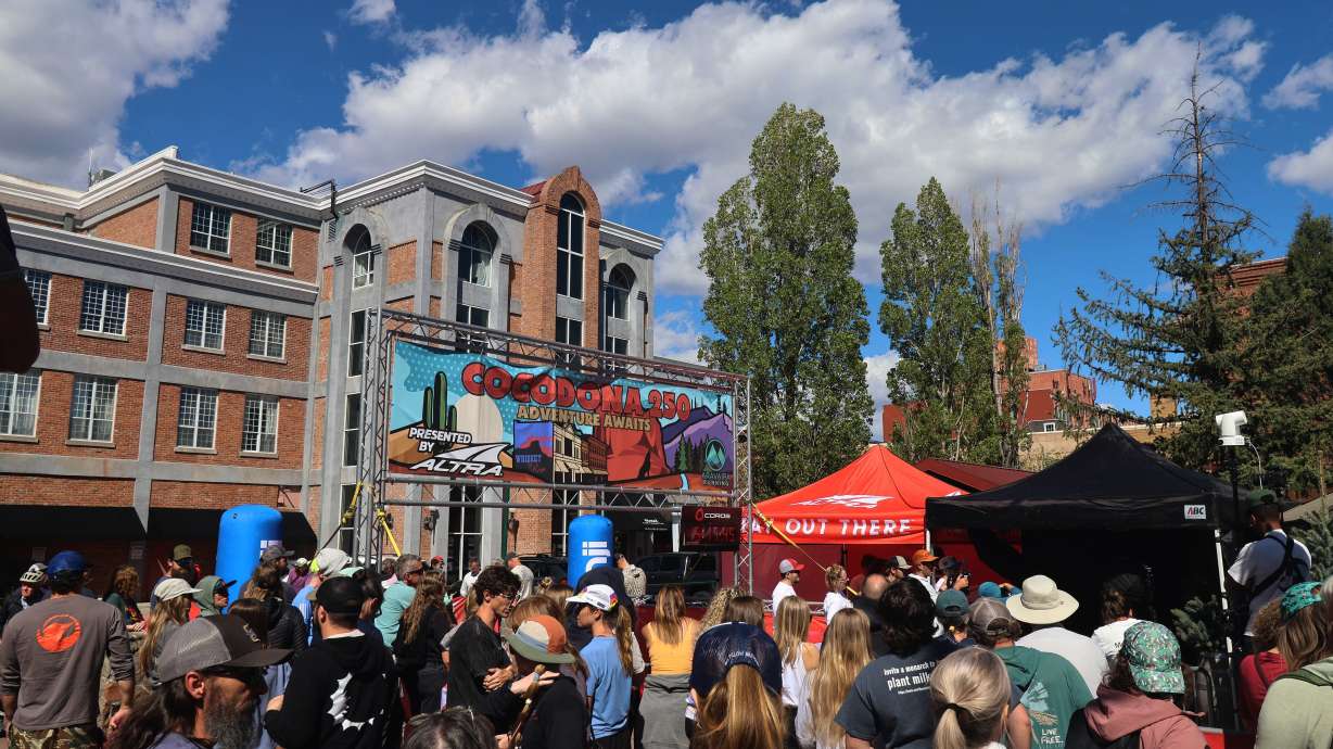 A crowd gathers to watch runners finish the Cocodona 250 ultramarathon in downtown Flagstaff, Ariz., on Wednesday, May 6, 2026.