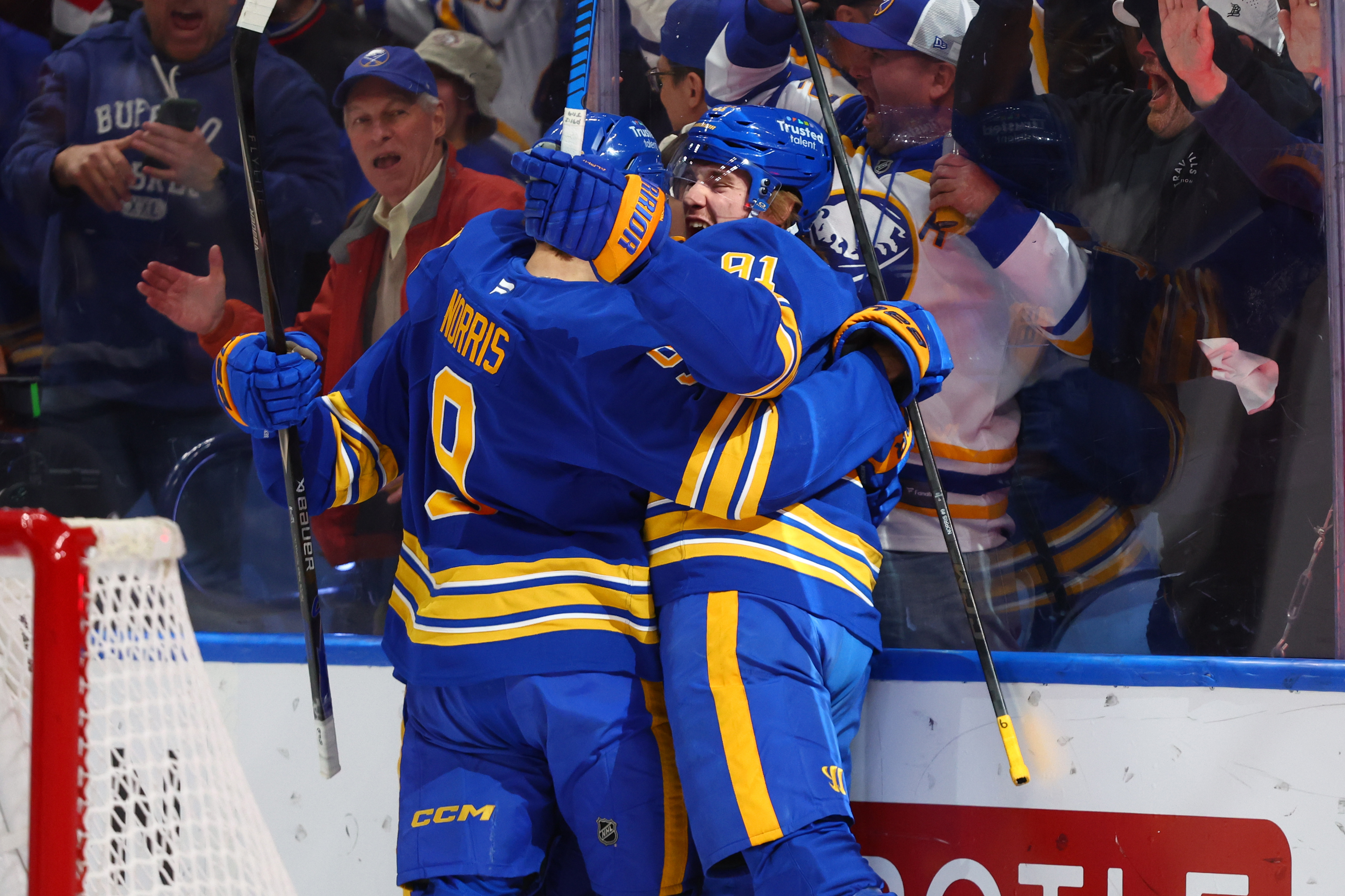 Buffalo Sabres right wing Josh Doan, right, celebrates his goal with center Josh Norris, during the first period in Game 1 of a second-round NHL hockey Stanley Cup playoff series, Wednesday, May 6, 2026, in Buffalo, N.Y. 