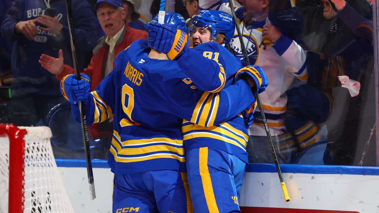 Buffalo Sabres right wing Josh Doan, right, celebrates his goal with center Josh Norris, during the first period in Game 1 of a second-round NHL hockey Stanley Cup playoff series, Wednesday, May 6, 2026, in Buffalo, N.Y.