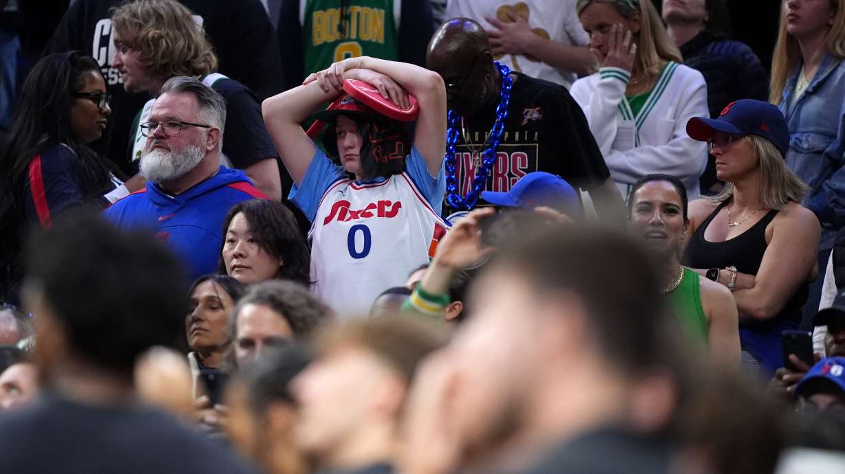 A Philadelphia 76ers' fan reacts during final minute of Game 3 against the Boston Celtics in a first-round NBA playoffs basketball series Friday, April 24, 2026, in Philadelphia.