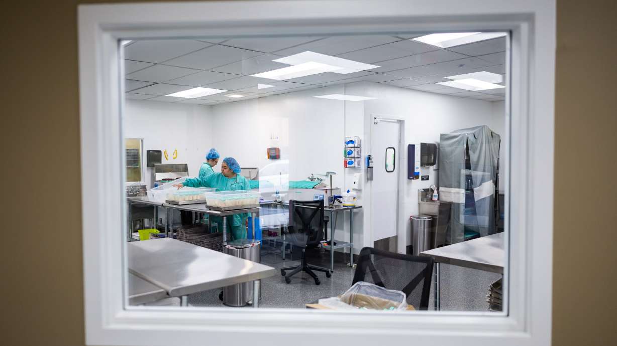 Allison Spencer, lab lead, and Vanessa Almaraz, lab technician, pasteurize milk at the Mountain West Mothers' Milk Bank in South Salt Lake on May 5.