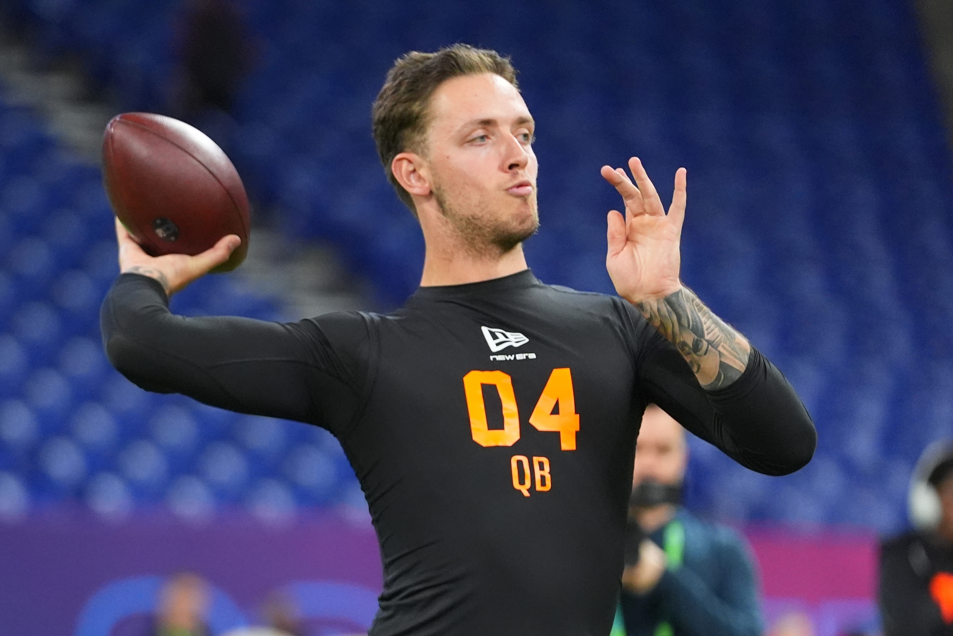 FILE - Miami quarterback Carson Beck (04) runs a drill at the NFL football scouting combine in Indianapolis, Feb. 28, 2026. 