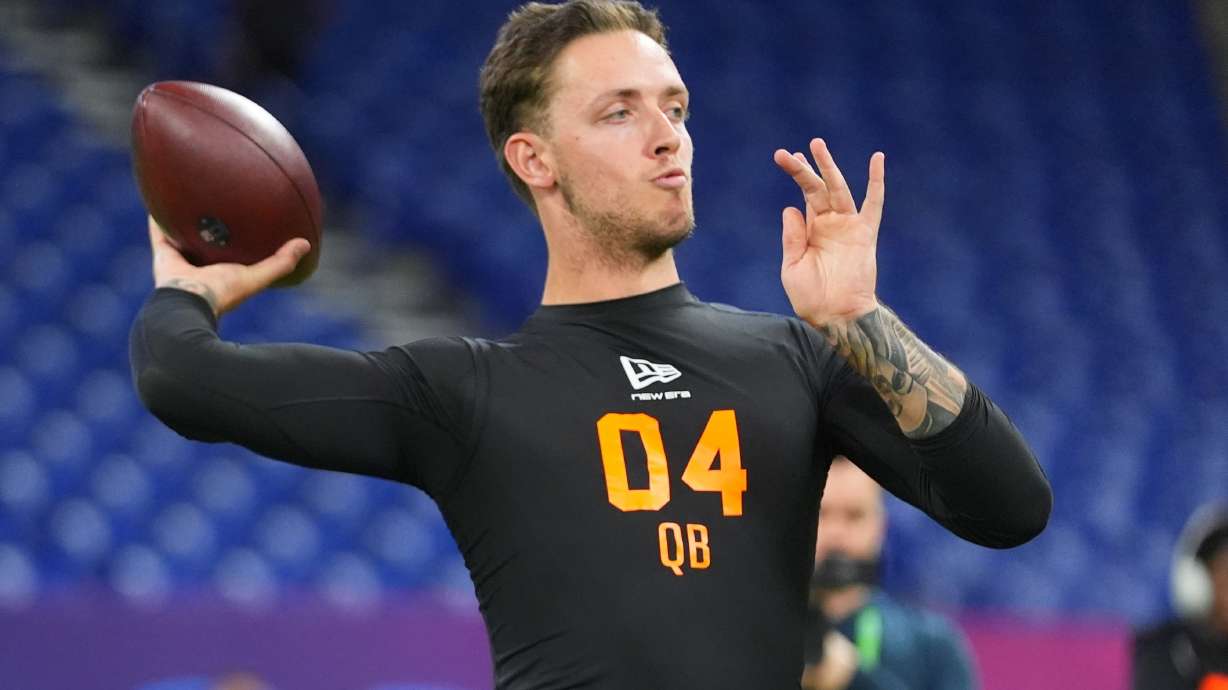 FILE - Miami quarterback Carson Beck (04) runs a drill at the NFL football scouting combine in Indianapolis, Feb. 28, 2026.