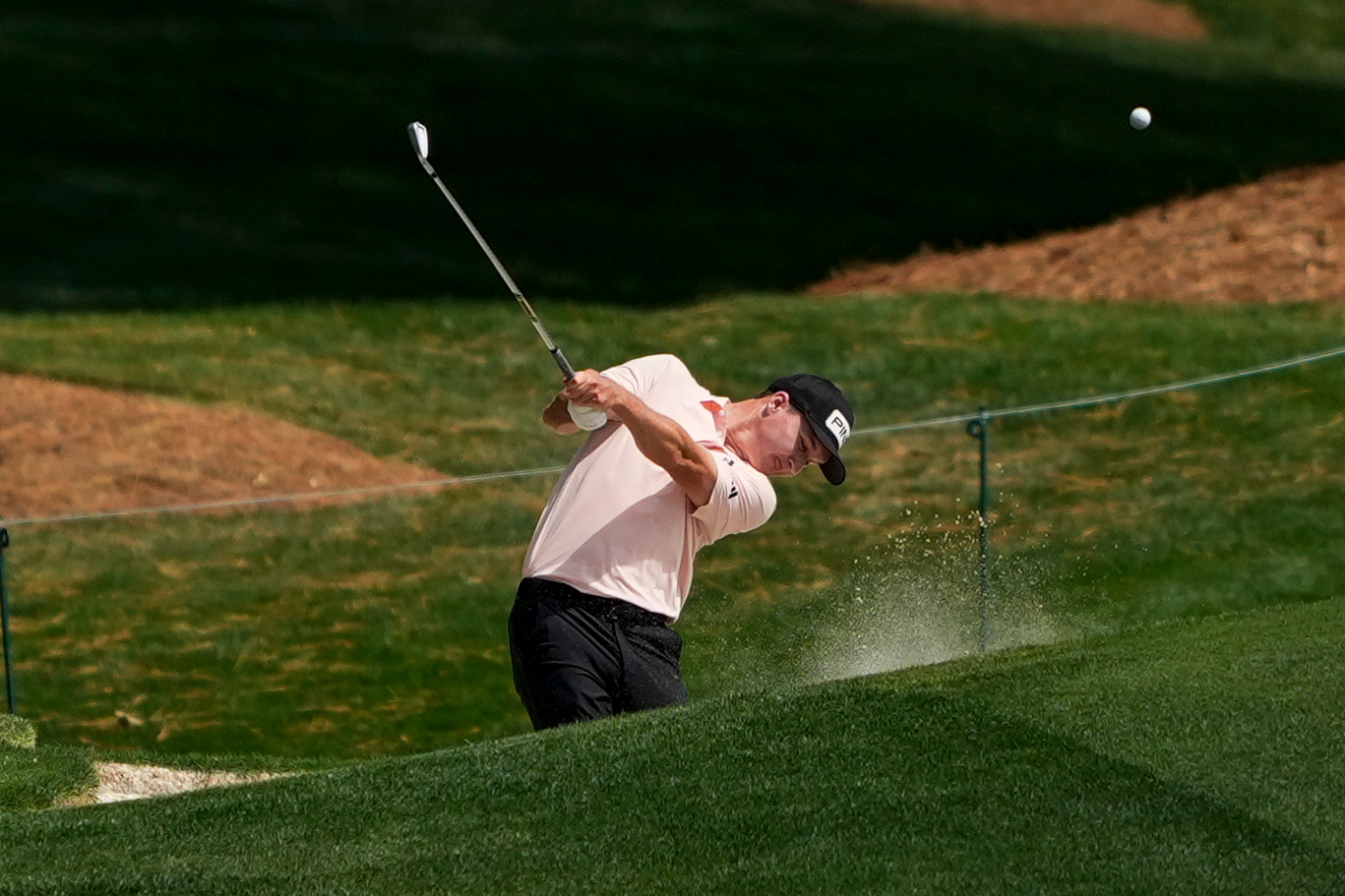 Matt McCarty hits from the 18th fairway during first round of the Truist Championship golf tournament at the Quail Hollow Club, Thursday, May 7, 2026, in Charlotte, N.C. 