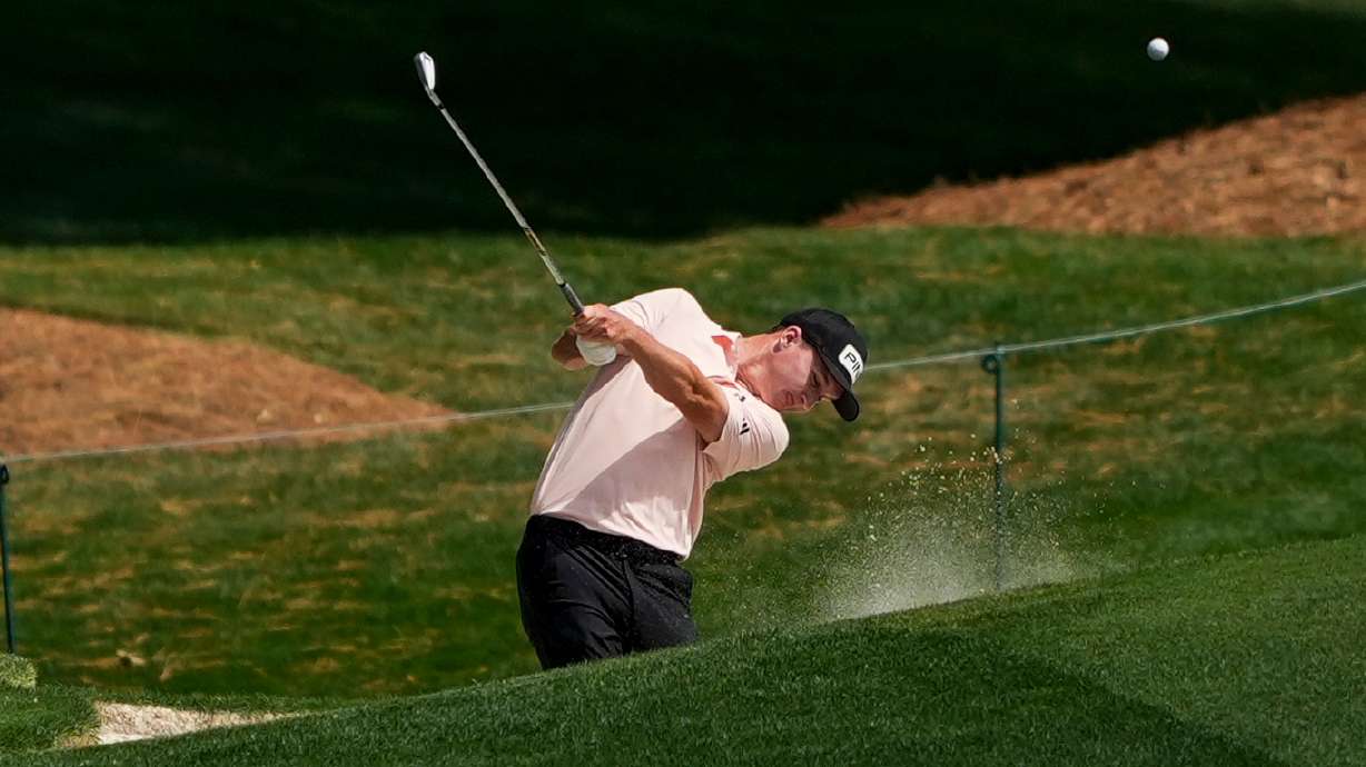 Matt McCarty hits from the 18th fairway during first round of the Truist Championship golf tournament at the Quail Hollow Club, Thursday, May 7, 2026, in Charlotte, N.C.