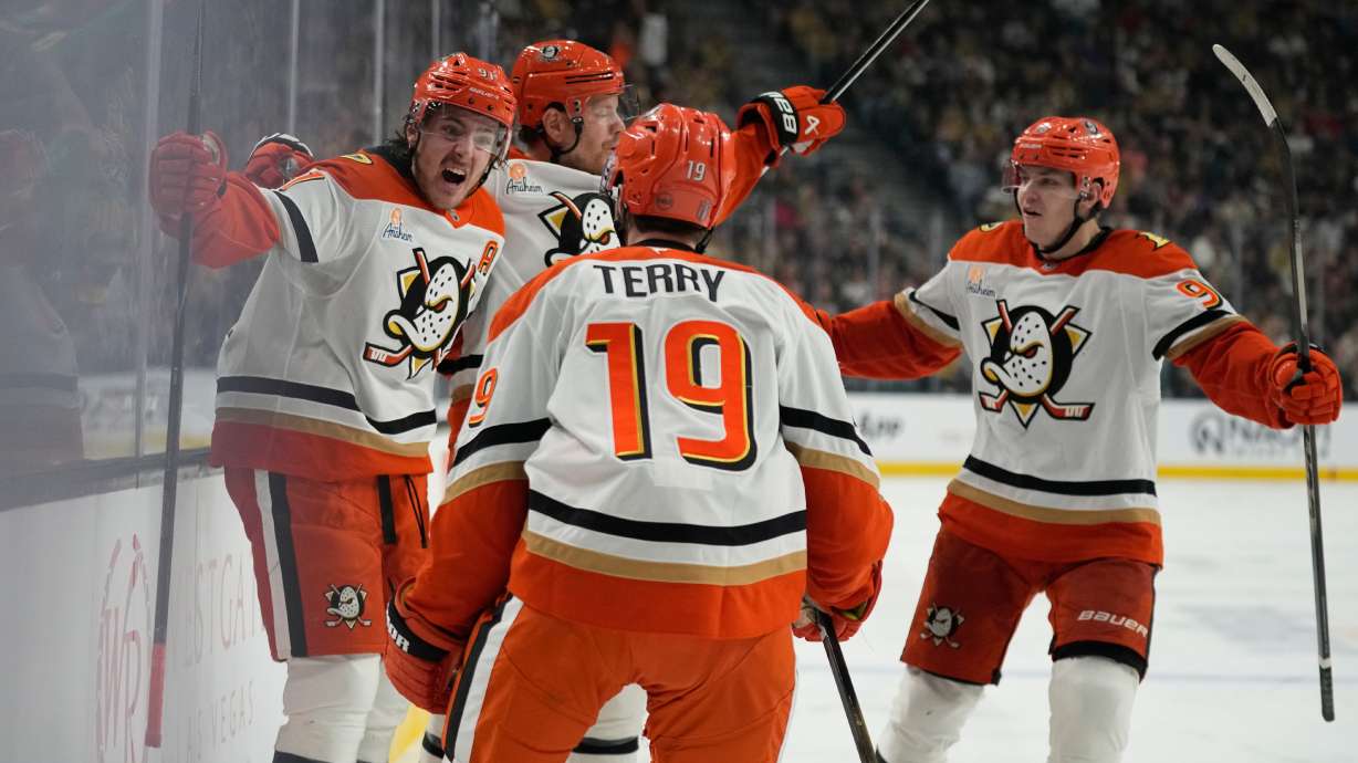 Anaheim Ducks center Leo Carlsson, left, celebrates after scoring against the Vegas Golden Knights during the third period of Game 2 of a second-round NHL hockey Stanley Cup playoff series Wednesday, May 6, 2026, in Las Vegas.