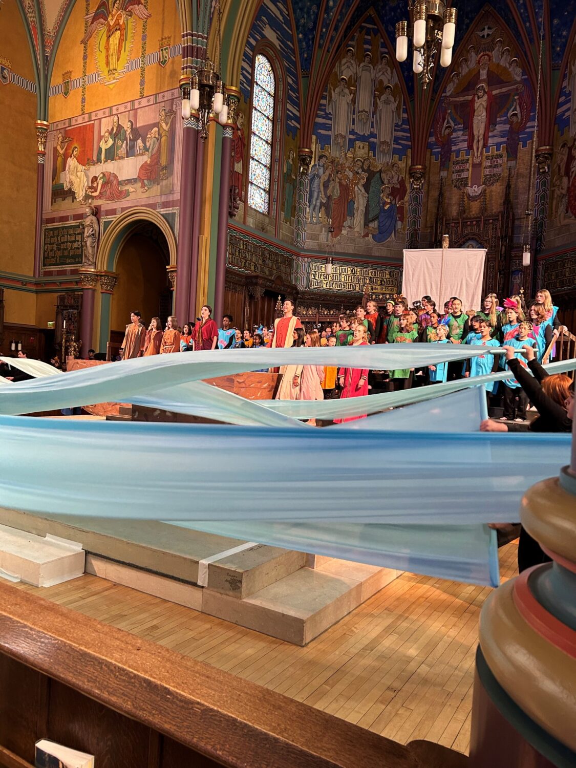 A rehearsal of "Noah's Flood" at the Cathedral of the Madeleine, Thursday. One hundred and sixty six students are participating in the performance.