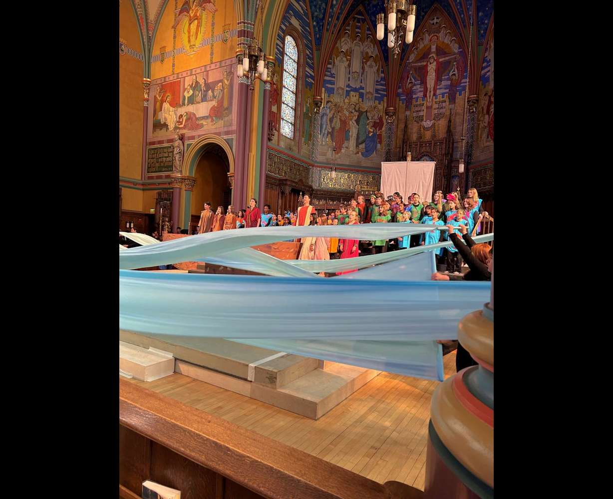 A rehearsal of "Noah's Flood" at the Cathedral of the Madeleine, Thursday. One hundred and sixty six students are participating in the performance.