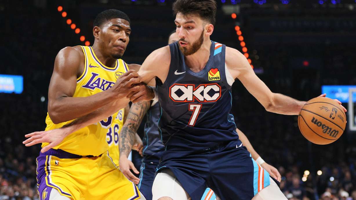 Oklahoma City Thunder center Chet Holmgren (7) works to the basket against Los Angeles Lakers forward Rui Hachimura (28) in the second half of Game 2 in a second-round NBA basketball playoffs series Thursday, May 7, 2026, in Oklahoma City.