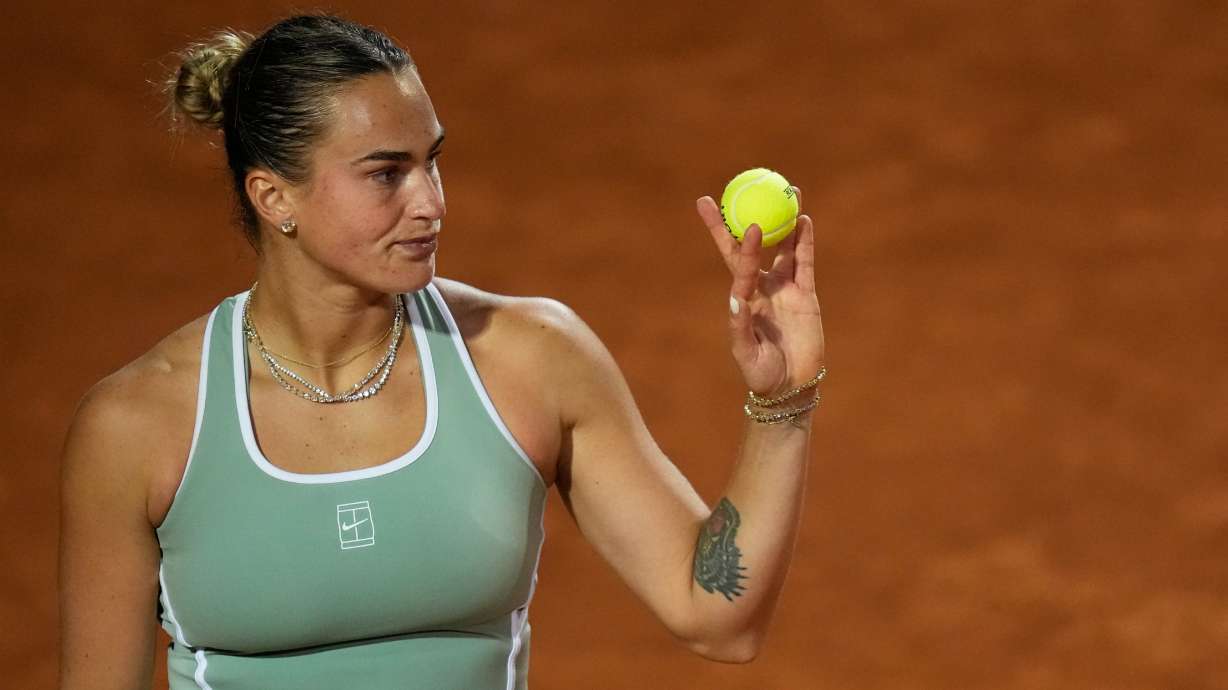 Aryna Sabalenka, of Belarus, prepares to serve the ball to Barbora Krejcikova, of Czechia, during their match at the Italian Open tennis tournament in Rome, Thursday, May 7, 2026.