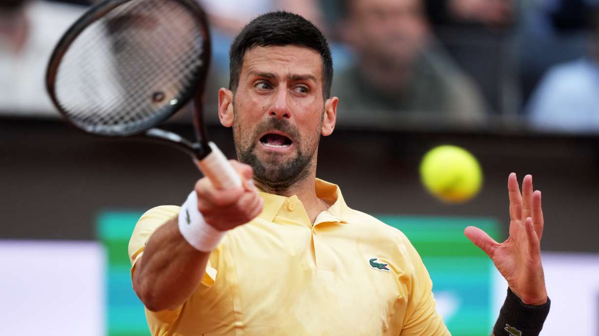 Serbia's Novak Djokovic returns the ball to Croatia's Dino Prizmic during their match at the Italian Open tennis tournament, in Rome, Friday, May 8, 2026.