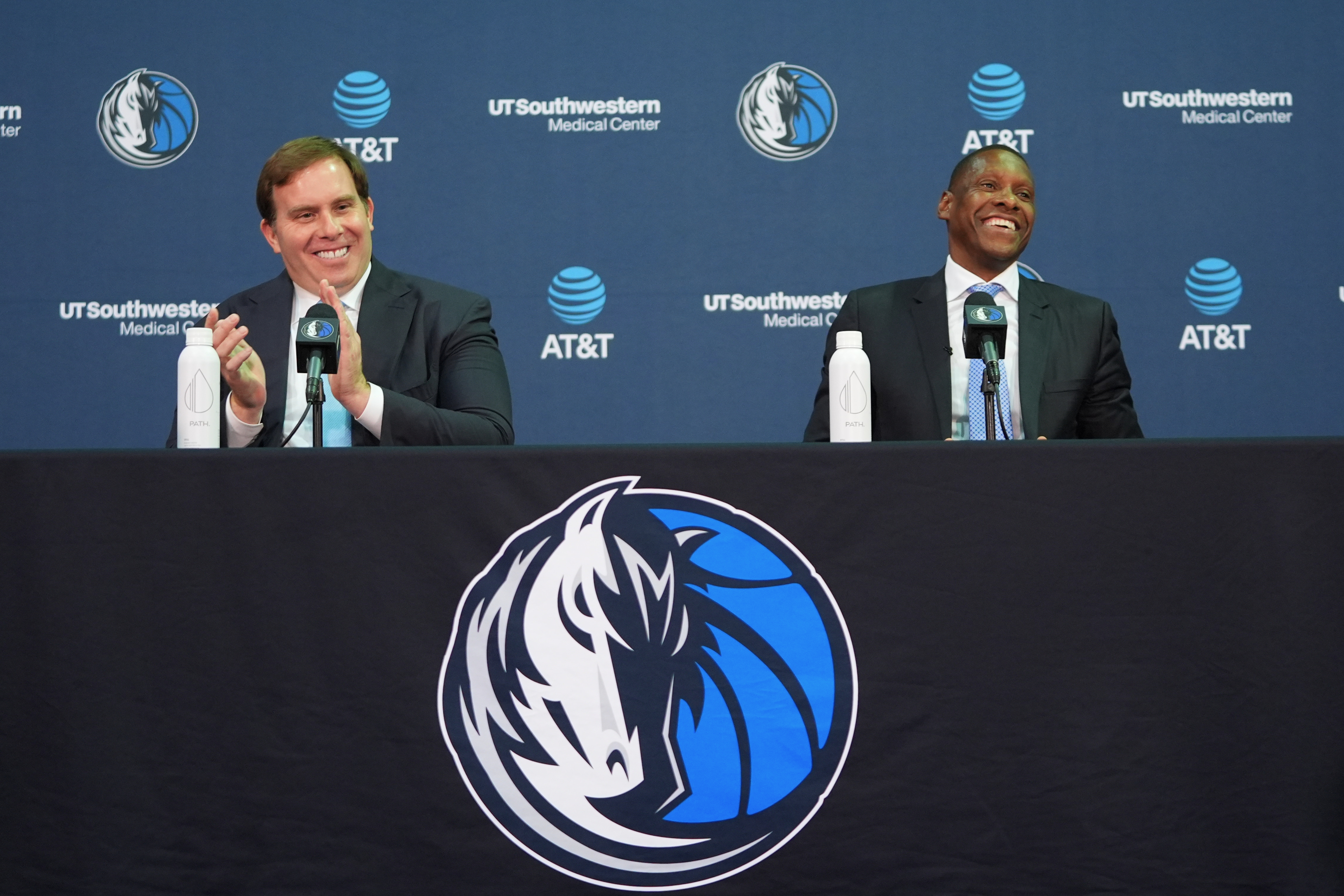 Dallas Mavericks' new team president Masai Ujiri, right, laughs as team governor Patrick Dumont claps during an introductory NBA basketball news conference in Dallas, Tuesday, May 5, 2026. 