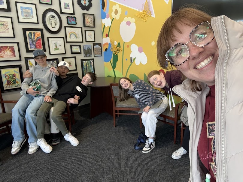 Advantage Arts Academy teacher Kaylei Lewis with some of her students. Lewis placed 15th in the quarterfinals of the America's Favorite Teacher competition.