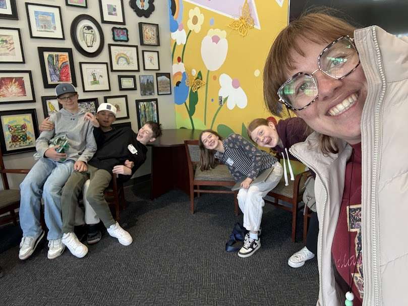 Advantage Arts Academy teacher Kaylei Lewis with some of her students. Lewis placed 15th in the quarterfinals of the America's Favorite Teacher competition.