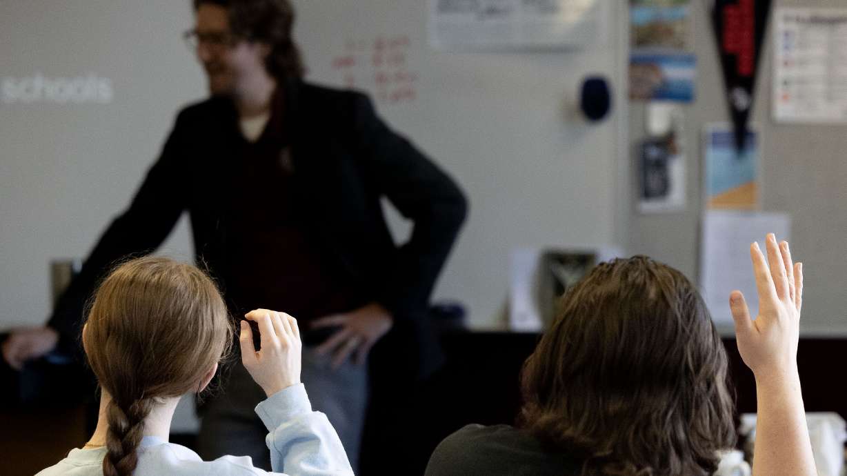 Students raise their hand during class at Jordan High School in Sandy on Jan. 15. Three beloved Utah teachers received extra community support this Teachers Appreciation Week as they made it to the quarterfinals of a national teacher competition.