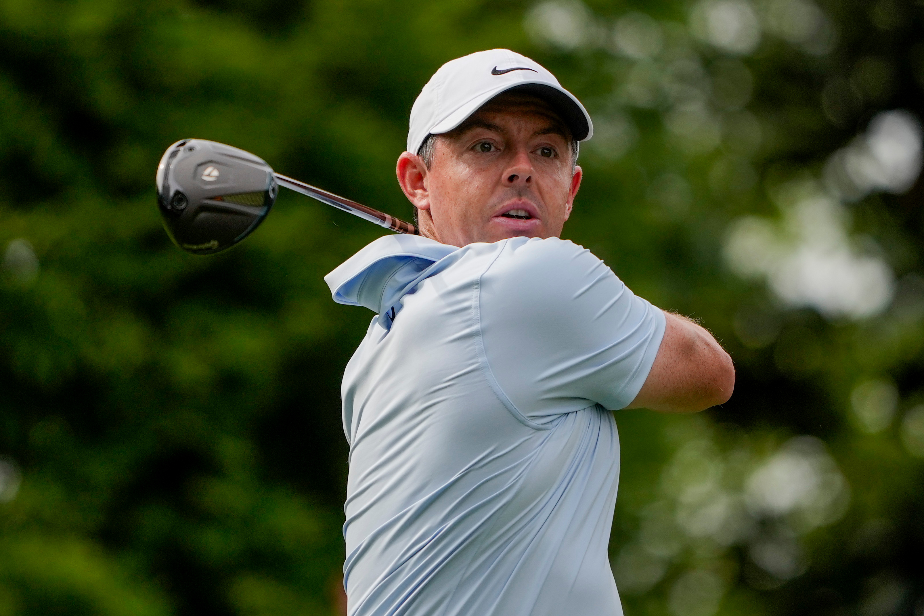 Rory McIlroy, of Northern Ireland, hits from the 16th tee during second round of the Truist Championship golf tournament at the Quail Hollow Club, Friday, May 8, 2026, in Charlotte, N.C. 