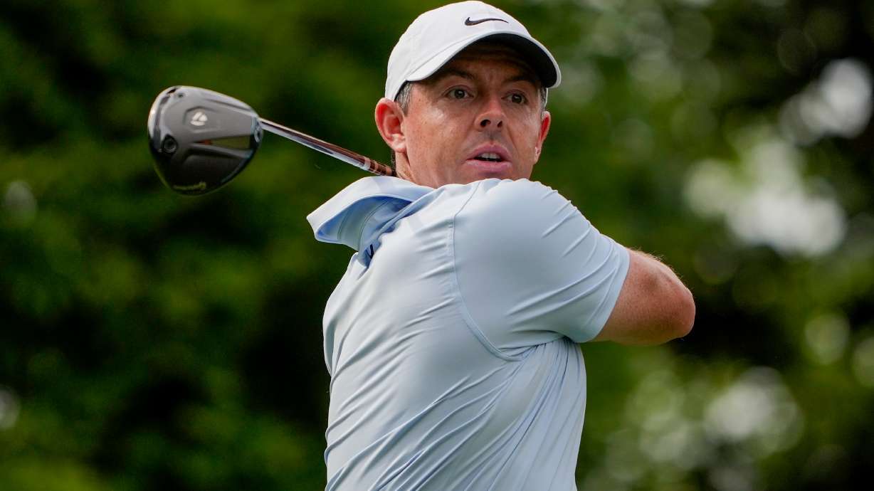 Rory McIlroy, of Northern Ireland, hits from the 16th tee during second round of the Truist Championship golf tournament at the Quail Hollow Club, Friday, May 8, 2026, in Charlotte, N.C.