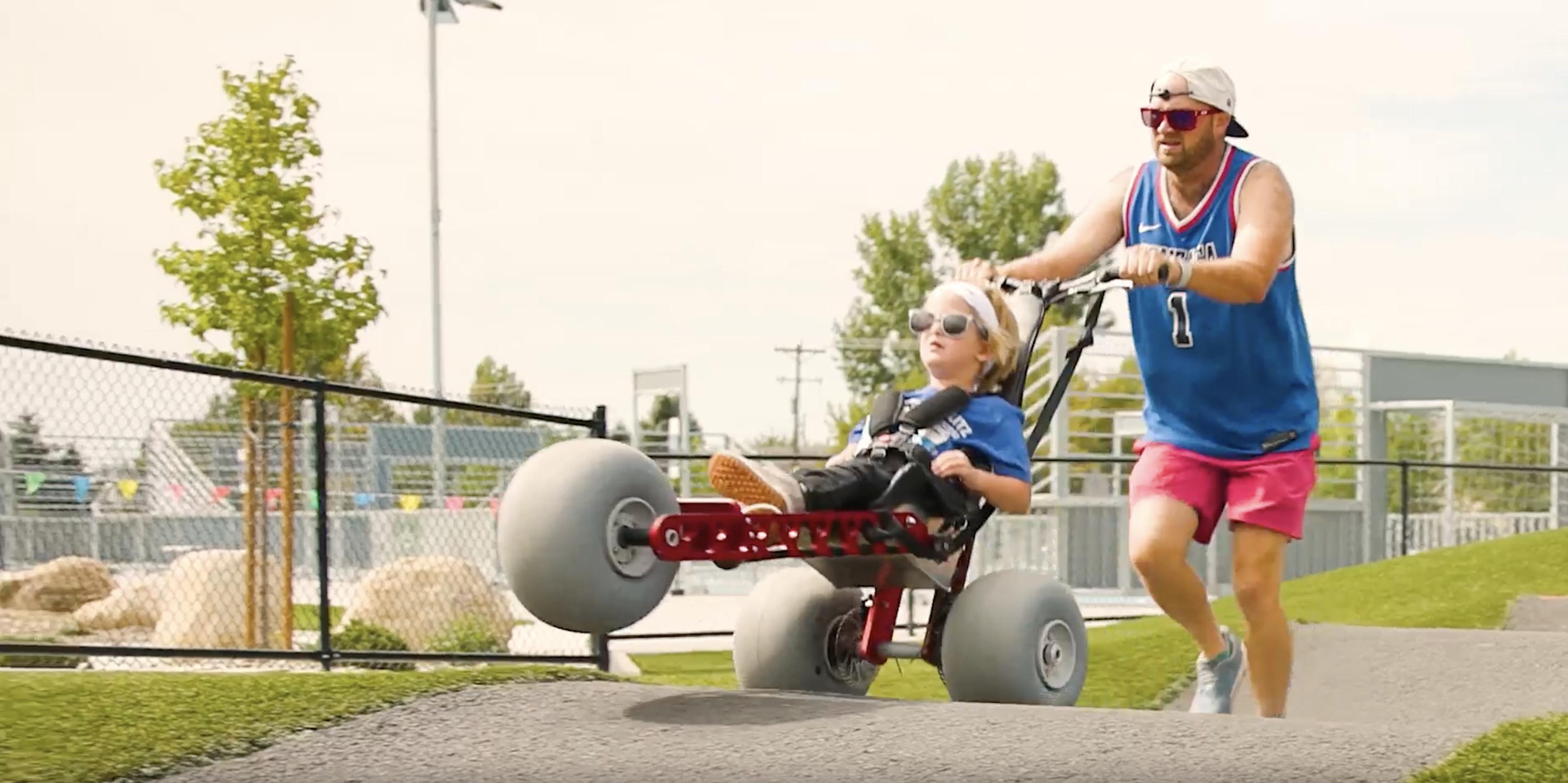 People participate in Pleasant Grove's Berserker Blitz, an adaptive obstacle course that uses all-terrain wheelchairs for people with disabilities, at Cook Family Park in September 2025.
