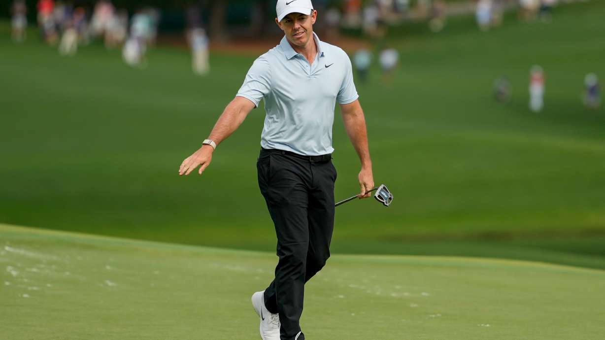 Rory McIlroy, of Northern Ireland, follows his shot on the 15th green during second round of the Truist Championship golf tournament at the Quail Hollow Club, Friday, May 8, 2026, in Charlotte, N.C.