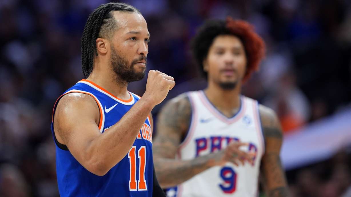 New York Knicks' Jalen Brunson, left, reacts past Philadelphia 76ers' Kelly Oubre Jr. during the first half of Game 3 in a second-round NBA basketball playoff series Friday, May 8, 2026, in Philadelphia.
