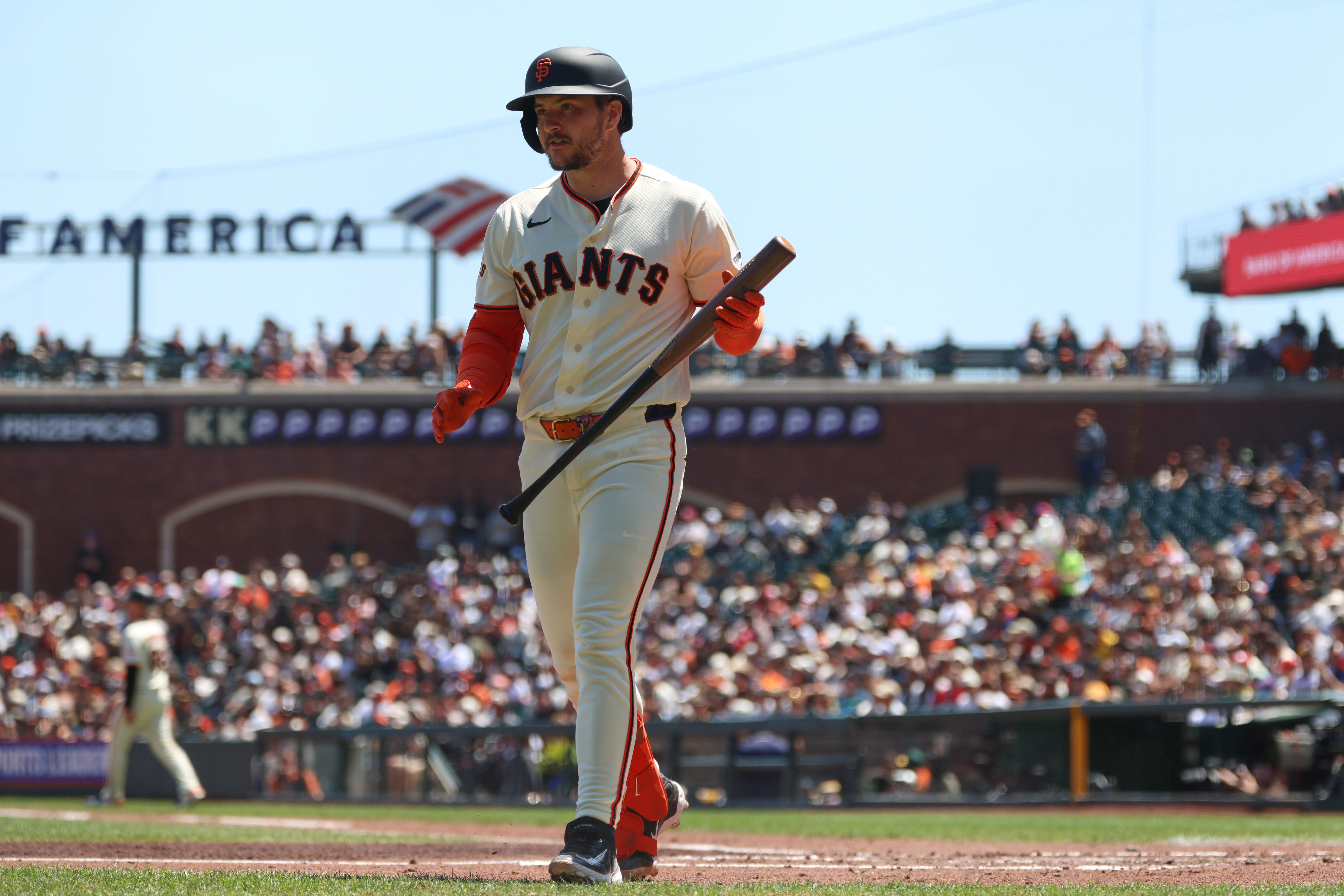 San Francisco Giants' Patrick Bailey walks back to the dugout after striking out against the San Diego Padres during the third inning of a baseball game in San Francisco, Wednesday, May 6, 2026. 