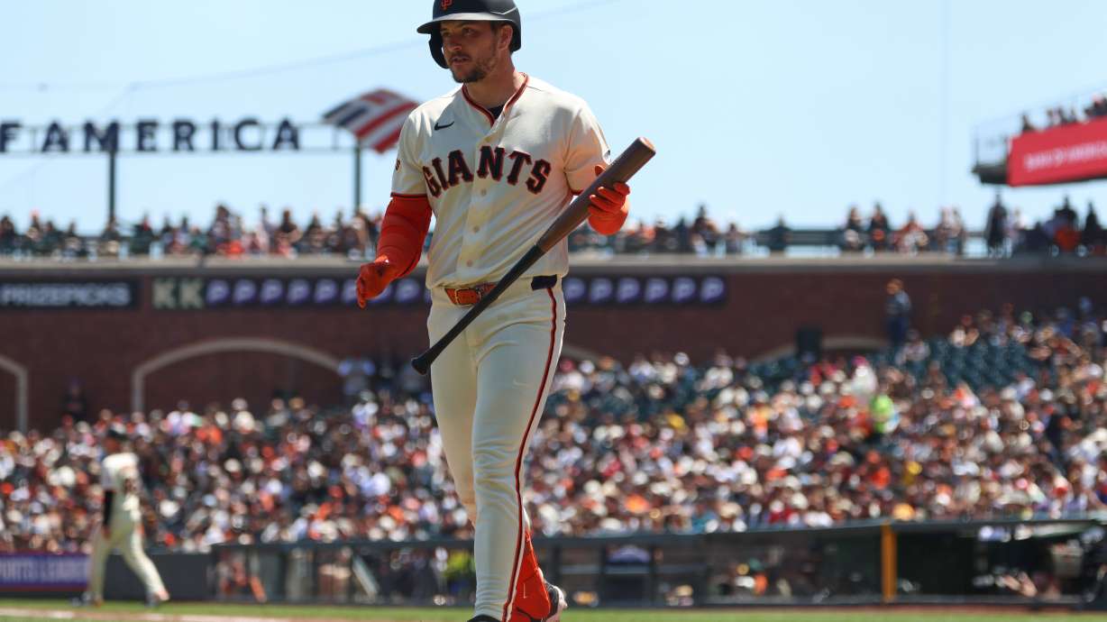 San Francisco Giants' Patrick Bailey walks back to the dugout after striking out against the San Diego Padres during the third inning of a baseball game in San Francisco, Wednesday, May 6, 2026.