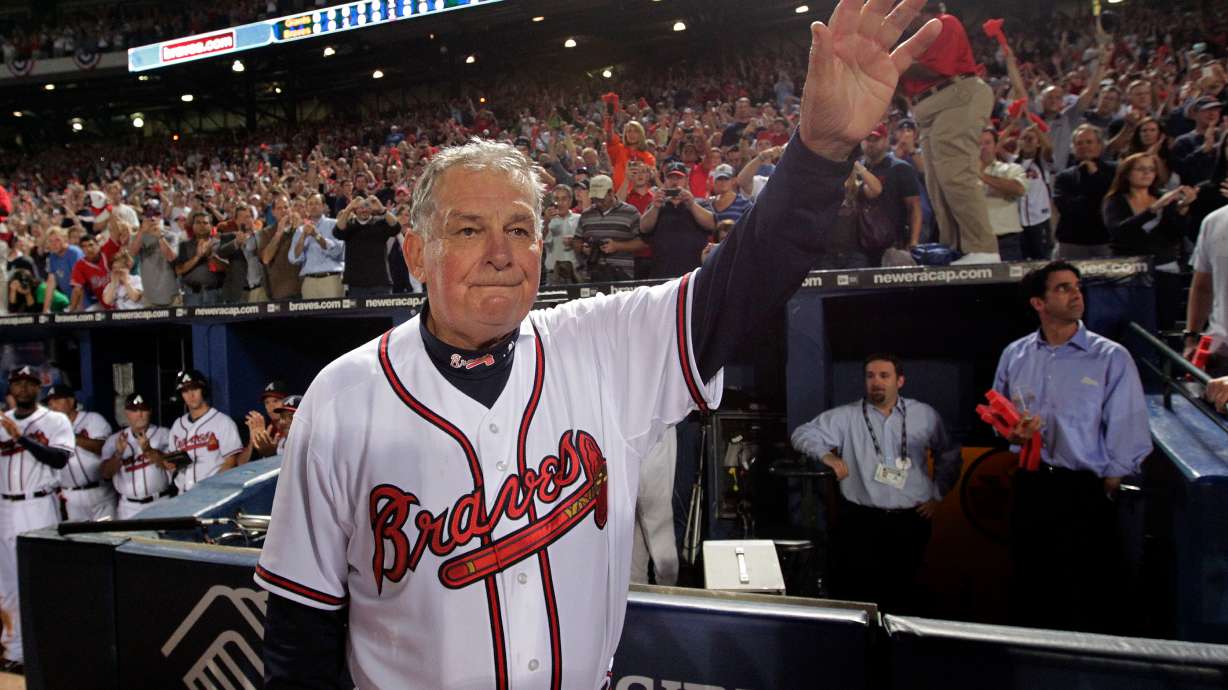FILE - Atlanta Braves manager Bobby Cox waves to fans after a loss to the San Francisco Giants in Game 4 of baseball's National League Division Series in Atlanta, Oct. 11, 2010.