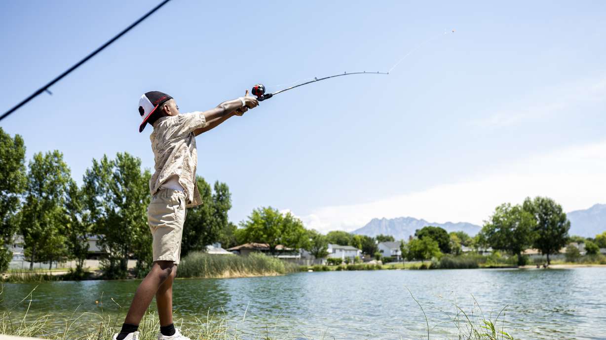 Natnael, 7, casts his line as participants of the Boys & Girls Clubs of Greater Salt Lake fish with help from local Walmart store associates at Willow Pond in Murray on July 16. Fishing will be profoundly impacted by drought in Utah this year.