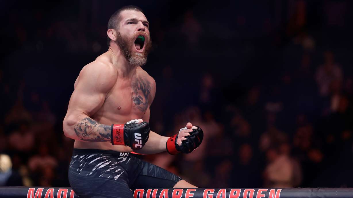 FILE - Jim Miller reacts after defeating Damon Jackson in a UFC 309 mixed martial arts lightweight title bout, Nov. 16, 2024, in New York.